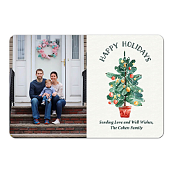 Fridge magnet on a white background this design has a family picture on the left half of this rectangular product while the right half has a decorative holiday tree with the words Happy Holidays over the top with a custom message under the tree 