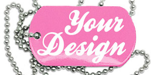 A pink military dog tag resting on a ball chain piled up on a white table. The tag reads, "Your Design".