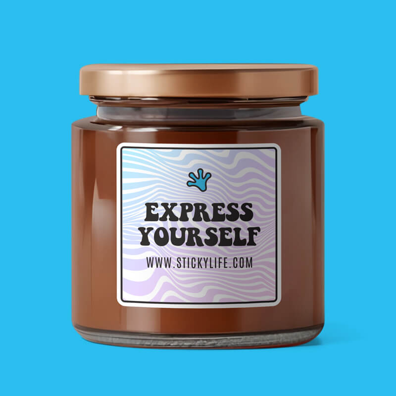 A square sticker with "Express Yourself" and a wavy background is affixed to a brown glass jar with a golden lid, placed against a blue background.